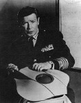 Richard Basehart holds the model of the Flying Sub
